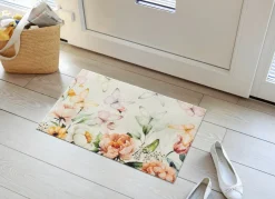 Ansprechende Fußmatte mit Blüten und Schmetterlinge