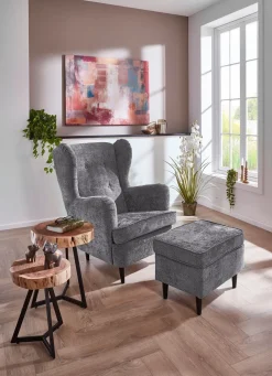 Ohrenbackensessel mit Hocker