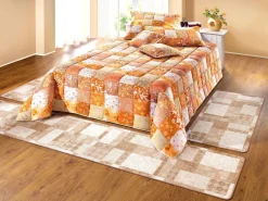 Tagesdecken und Kissenbezüge in Patchwork-Optik aus Baumwolle